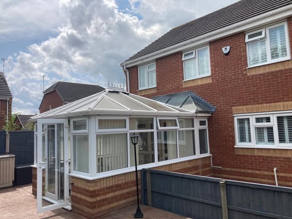 Before: old, tired polycarbonate conservatory roof